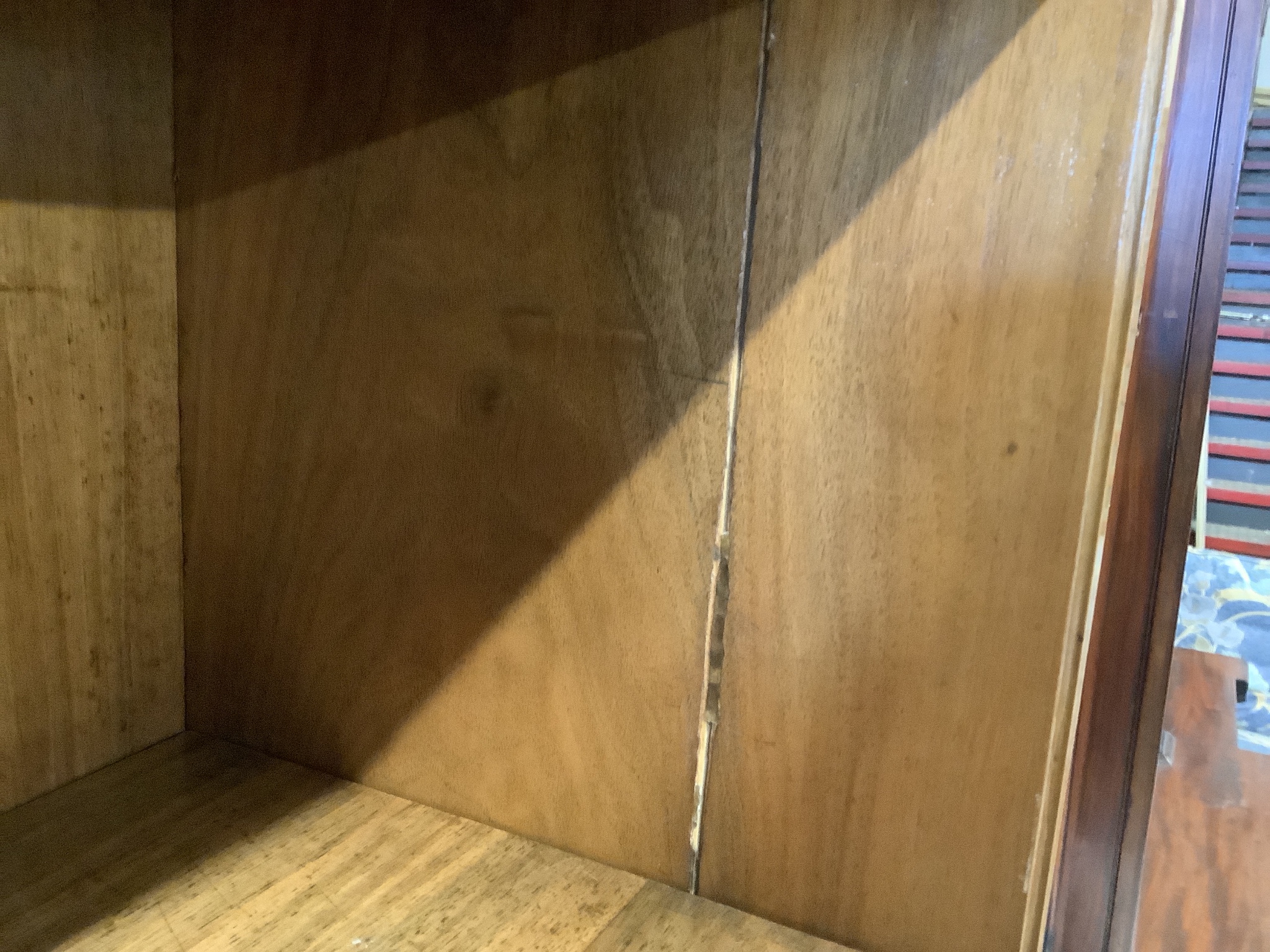 A mid century walnut open bookcase cupboard, length 186cm, depth 30cm, height 220cm